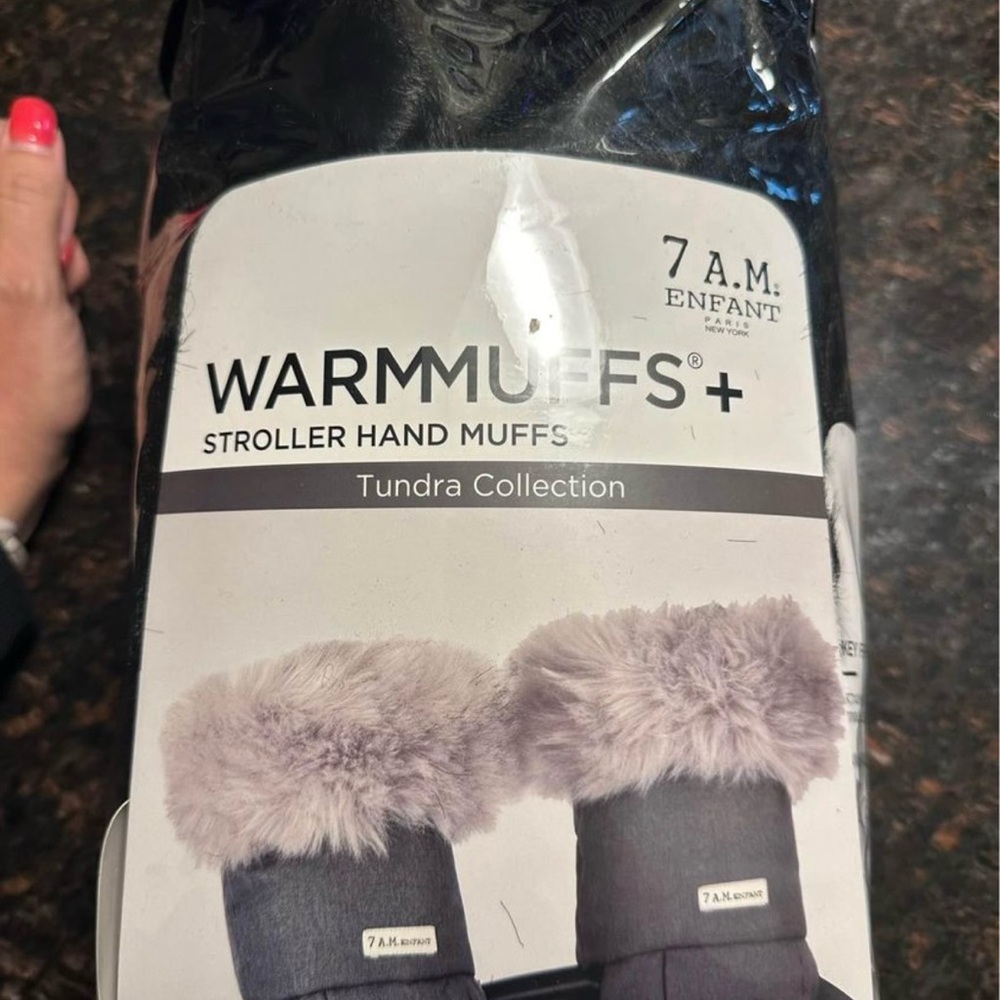 Brand new 7AM warm muffs for stroller. Fur is also detachable.